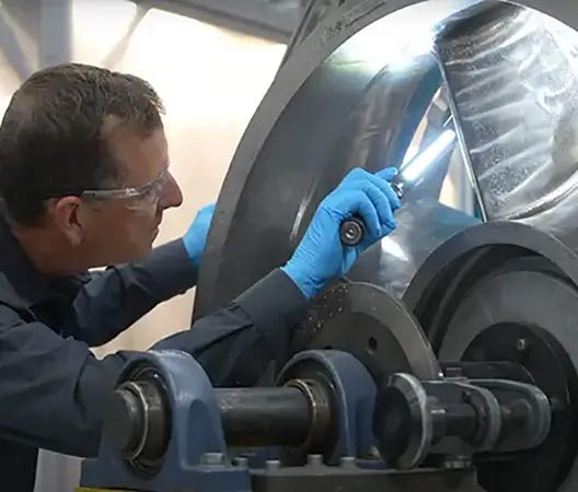 Man inspecting aerospace finishing